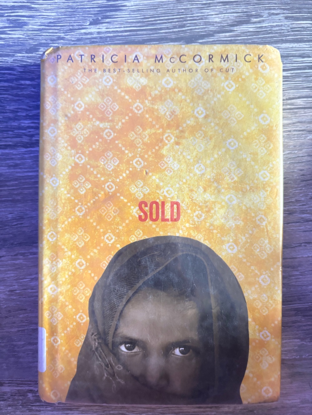 Sold by Patricia McCormick - Yellow Cover Paperback